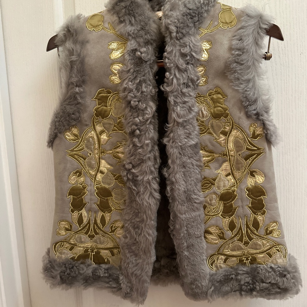 Tory Burch shearling vest with gold embroidery